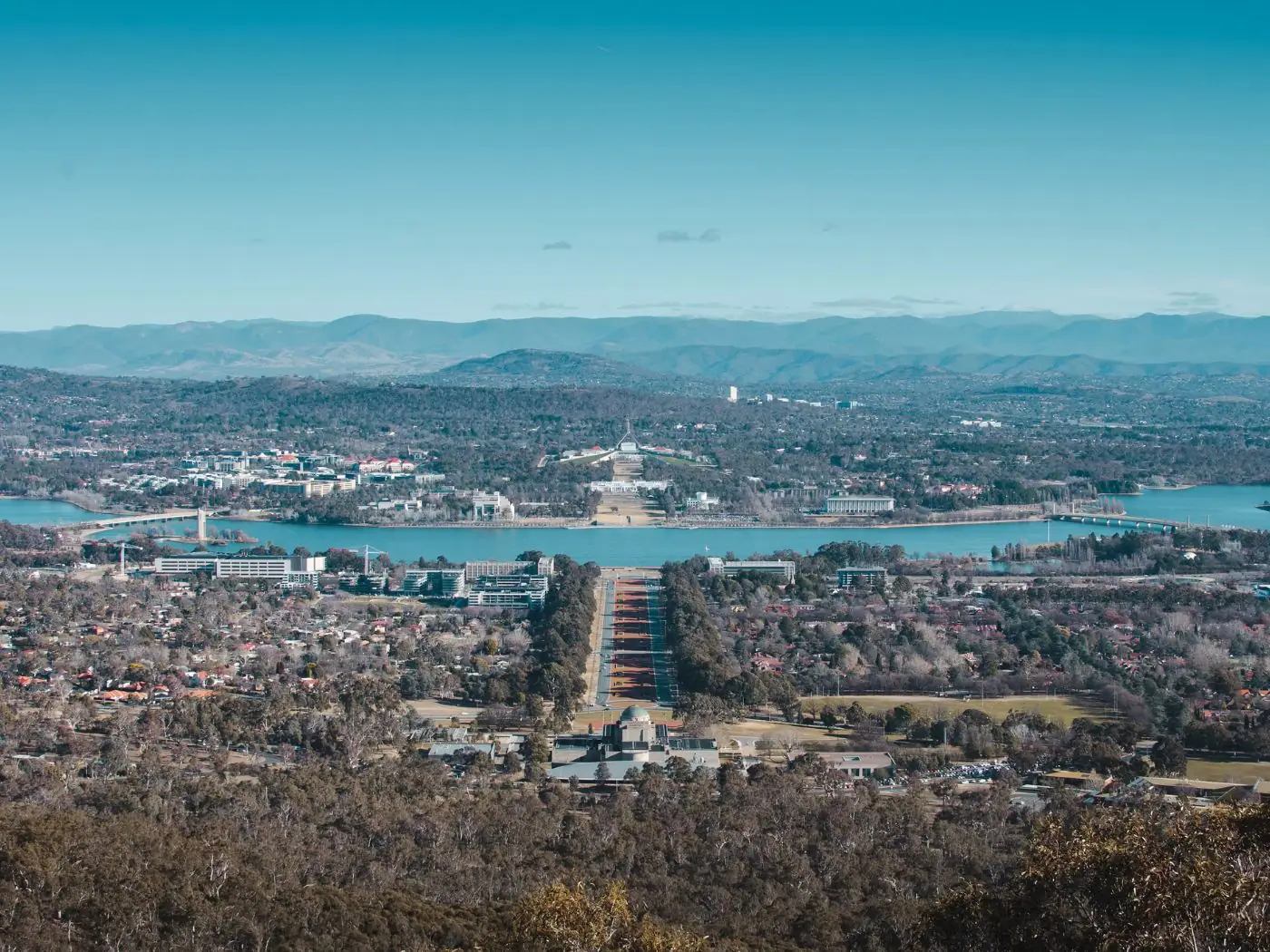 View over the Australian War Memorial and Anzac Parade towards Lake Burley Griffin and Parliament House in Canberra